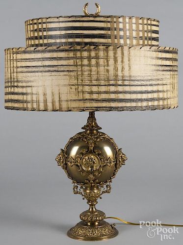 Embossed brass table lamp, 24'' h.