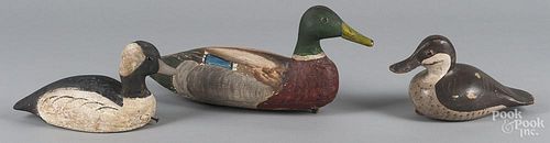 Five carved and painted duck decoys, mid 20th c., longest - 17 1/2''.