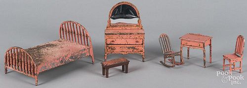 Five pieces of Arcade salmon color doll house bedroom furniture.