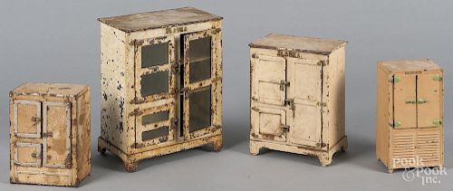 Four Arcade doll house cabinets and refrigerators.