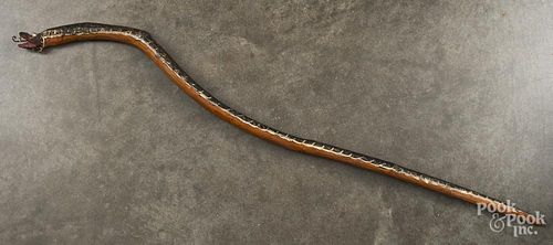 Carved and painted snake cane, 39'' h.