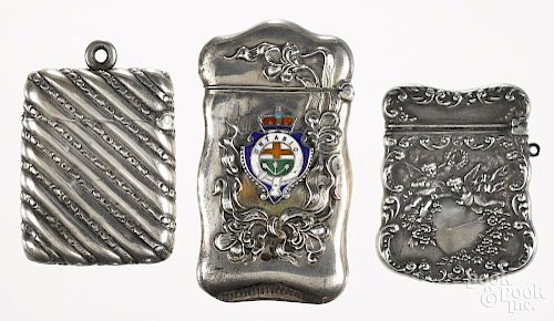 Three sterling match vesta safes, to include an Ontario souvenir, one with diagonal bands