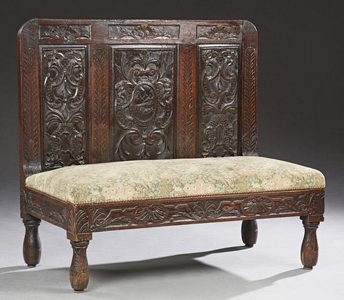 Spanish Style Carved Oak Bench, 19th c., the high
