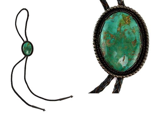 Navajo - Probably Pilot Mountain Turquoise, Silver, and Leather Bolo Tie c. 1950s, 2.25" x 1.75" bolo (J15987-001)