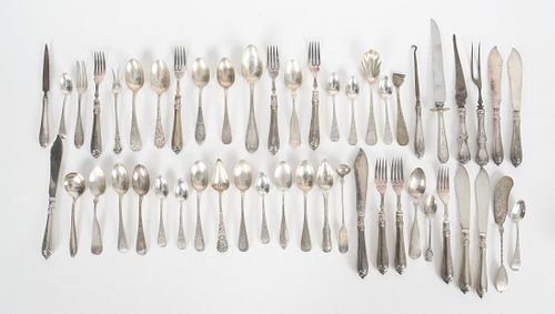 A Large Group of Assorted Coin and Sterling Flatware