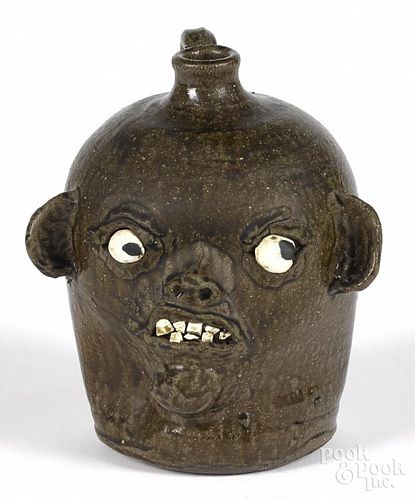 Chester Hewell, stoneware face jug, 9'' h.