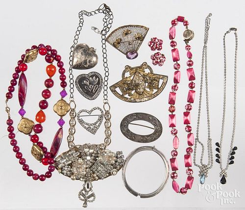 Thirteen pieces of assorted costume jewelry.