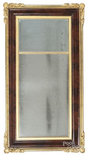 Empire mahogany and giltwood mirror, mid 19th c., 53'' x 27 1/4''.