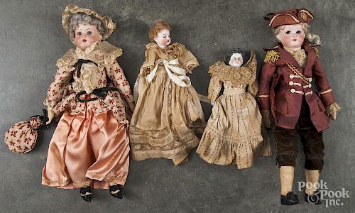 Pair of German bisque character dolls, ca. 1900, with original outfits, 14'' h.