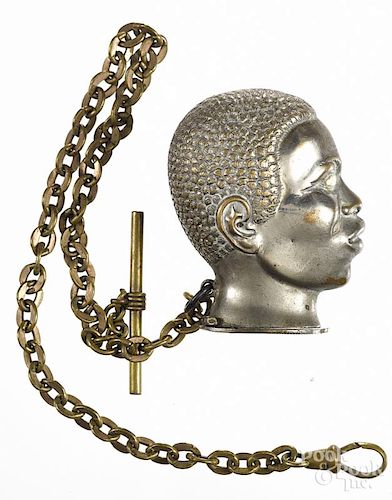 Black Americana figural silver-plated match vesta safe with a brass watch chain, 2'' h.