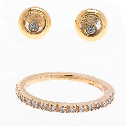 Media churumbela y par de broqueles con diamantes en oro amarillo de 14k y 18k de la firma Chopard y Bizzarro. Peso: 5.5 g.