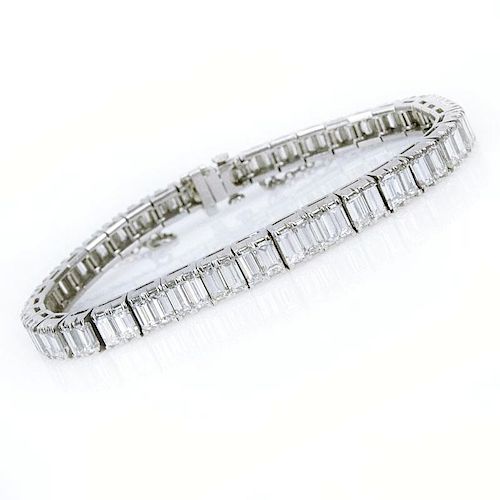 Super Quality Art Deco Approx. 15.0 Carat Graduated Emerald Cut Diamond and Platinum Bracelet.