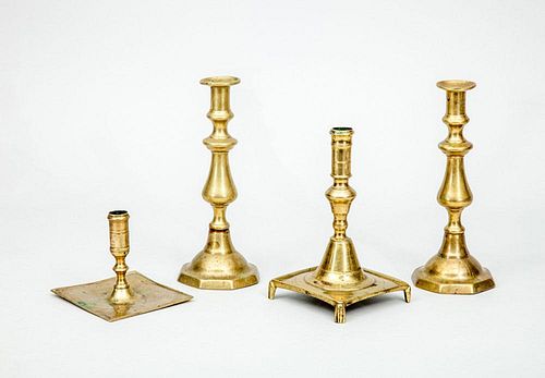 TWO CONTINENTAL BAROQUE BRASS CANDLESTICKS AND A PAIR OF VICTORIAN CANDLESTICKS