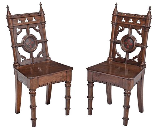 Pair Gothic Revival Carved and Painted Oak Hall Chairs