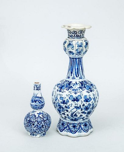 DUTCH DELFT BLUE AND WHITE LARGE REEDED VASE AND A SMALLER DOUBLE-GOURD-FORM VASE