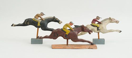 THREE CARVED AND PAINTED WOOD HORSE RACERS
