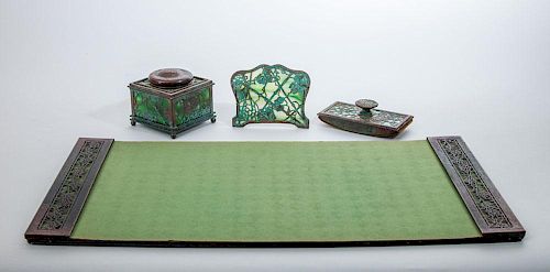 TIFFANY STUDIOS BRONZE AND FAVRILE GLASS INKWELL, IN THE 'GRAPEVINE' PATTERN; A ROLLER BLOTTER AND PEN HOLDER, IN THE 'WOODBI