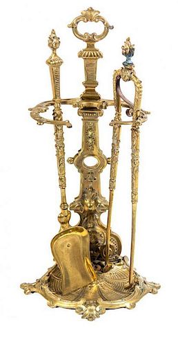 * A Louis XV Style Brass Fire Fender and Fireplace Tools on Stand Width of fender 53 inches.