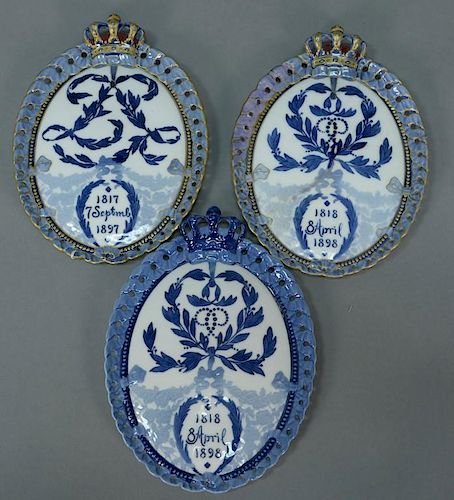 Three Royal Copenhagen porcelain oval plaques, one commemorating the 80th Birthday of Queen Louise 1817-1897 and the other tw