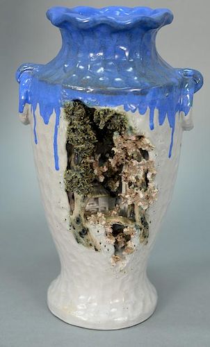 Satsuma three dimensional vase having mountainous three dimensional landscape with houses and trees, marked on bottom. 
heigh