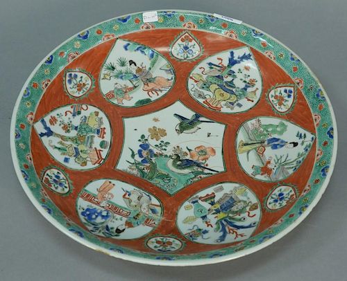 Chinese deep charger depicting seven panels, 19th century. 
(minor ridge chips) 
height 14 1/2 inches