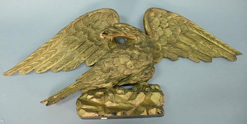 Carved wood eagle with outstretched wings set on realistic rocks, late 19th to early 20th century. height 15 1/2 inches, wid
