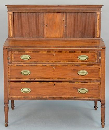Sheraton mahogany tambour desk in two parts set on turned legs, circa 1830. 
height 47 1/2 inches, width 39 inches, depth 20 