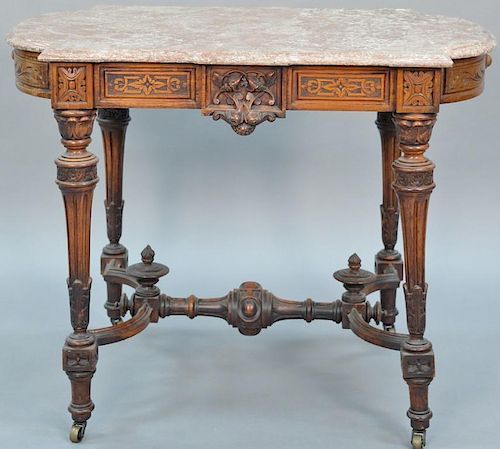 Victorian walnut marble top table having shaped brown marble on conforming base with stretcher.  height 30 inches, top: 26" x