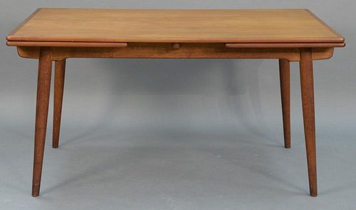 Hans Wegner dining table by Andreas Tuck. 
height 28 1/2 inches, top closed: 35" x 55", top open: 35" x 93"