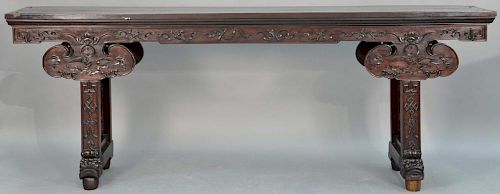 Chinese hardwood altar table having rectangular top over bat carved skirt and carved front with pierced carved supports set o