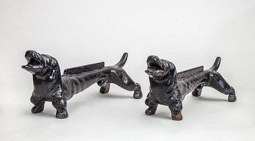 PAIR OF CAST-IRON BLACK PAINTED DACHSHUND-FORM BOOT SCRAPES