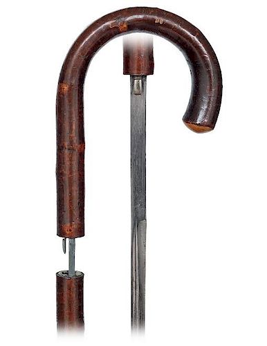 2. Wild Cherry Sword Cane -Ca. 1890 -Entirely fashioned of a well-dressed wild cherry branch with a crook handle and a metal