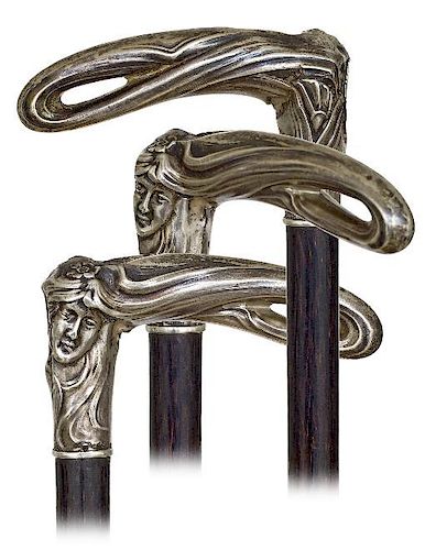 5. Silver Figural Art Nouveau Dress Cane -Ca. 1900 -L-shaped silver handle beautifully modeled with the head of a beauty with