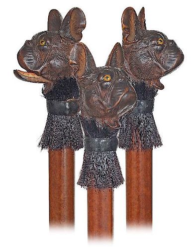 7. Glove Holder Cane -Ca. 1890 -Large fruitwood knob carved to depict a bulldog's head with the characteristic folded face, t