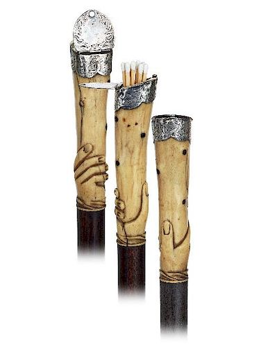 29. Silver and Bone Vesta Cane -Ca. 1880 -Vertical handle fashioned of a longer and stretching bone body carved in the shape 
