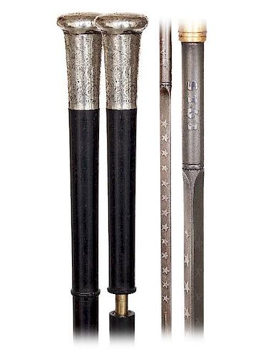 30. Sword Cane -Ca. 1900 -Milord silver knob with a straight tapering and densely engraved body and a widening and plain roun
