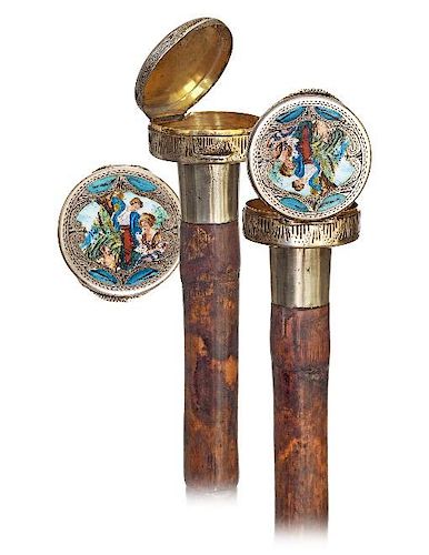 53. Dual Purpose Silver and Enamel Cane -Ca. 1900 -Circular silver knob with an integral grooved collar finely engraved and e
