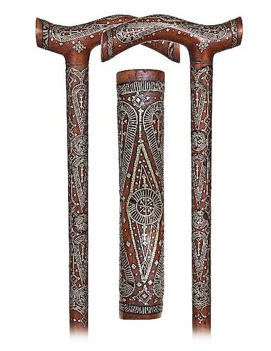 105. South Russian Piqué Dress Cane -Ca. 1880 -Holly wood cane with an Opera shaped handle densely set on its upper part wit