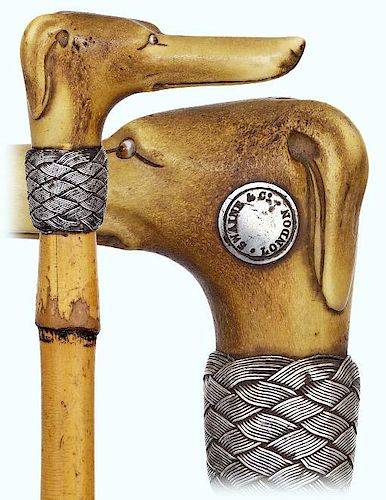 107. Dog Day Cane -Ca. 1890 -Stylized carved of stag horn in a basic L-shape with a long muzzle and hanging ears and embellis