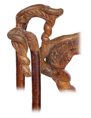 110. Folk Art Cane -Dated 1859 -Fashioned of a single piece, straight wild cherry branch with a naturally grown curving top c