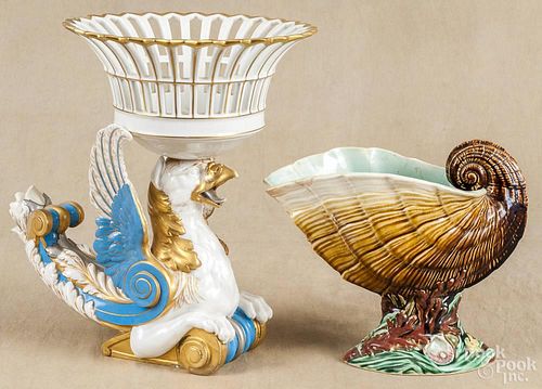 Porcelain compote with griffin support, 19th c., 13'' h., together with a majolica shell dish