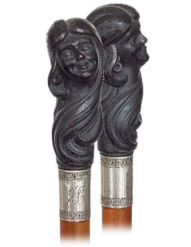 115. Art Nouveau Figural Cane -Ca. 1900 -Large wood woman head knob on a malacca shaft with a wider silver collar engraved wi