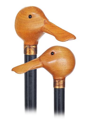 138. Duck Day Cane -Ca. 1920 -Flamed lemonwood duck head with a broad beak and inset glass eyes, dark rosewood shaft with a m