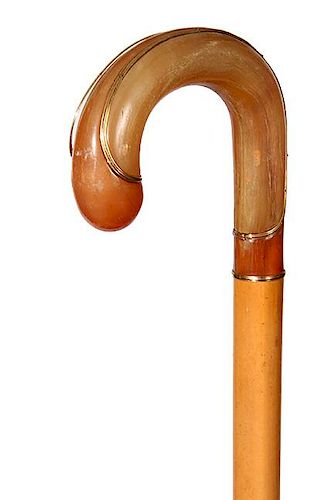176. Deco Horn Dress Cane- Ca. 1920- An unusual example of two colors, both blonde and rust horn which have been segmented to