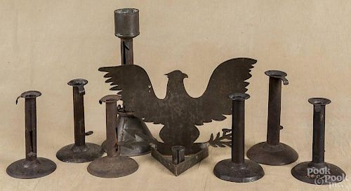 Six tin hogscraper candlesticks, 19th c., tallest - 6'', together with a tin push-up candlestick