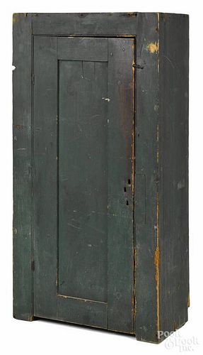 Pennsylvania painted pine canning cupboard, 19th c., retaining an old green surface, 56'' h.