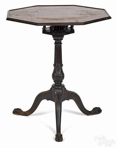 Chippendale style mahogany candlestand, 20th c., with carved standard and knees