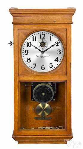 Self Winding Clock Co. wall clock, early 20th c., 41'' h., 18'' w.