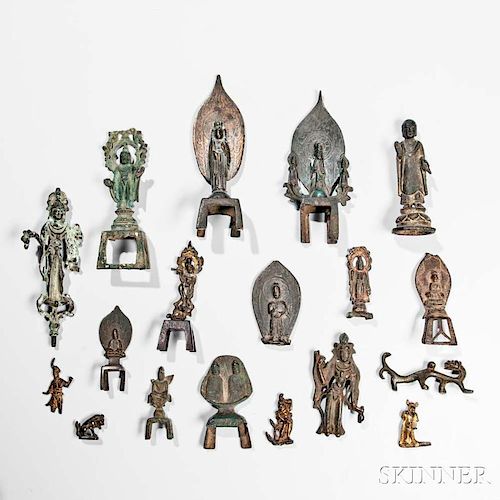 Eighteen Mostly Buddhist Archaic Gilt-bronze and Bronze Miniature Items 青銅佛造像及法器一組