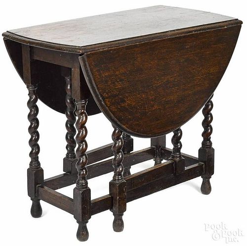 Jacobean style oak gateleg table with barley twist legs, 28 1/2'' h., 18 1/4'' w., 34 1/4'' d.